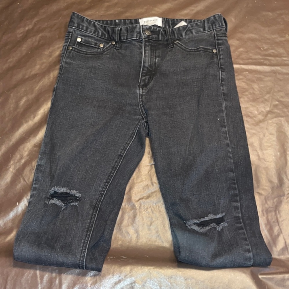 Black jeans with holes in the knee/low thigh